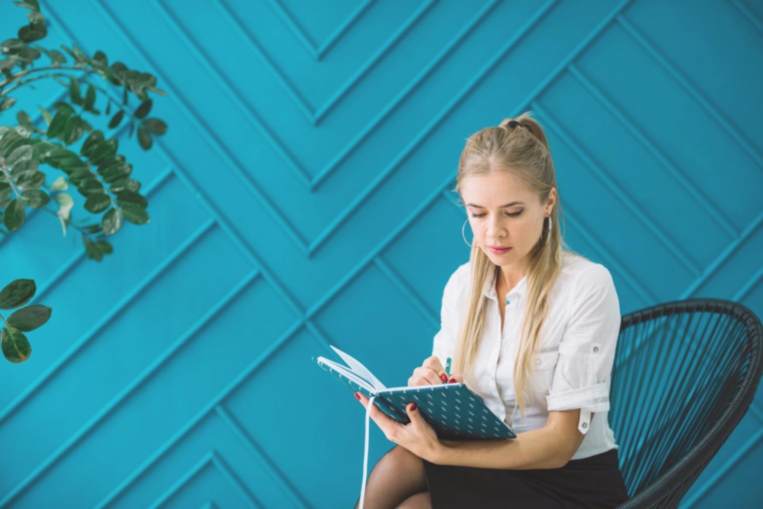 Detailed financial analysis and business valuation documents spread across conference table